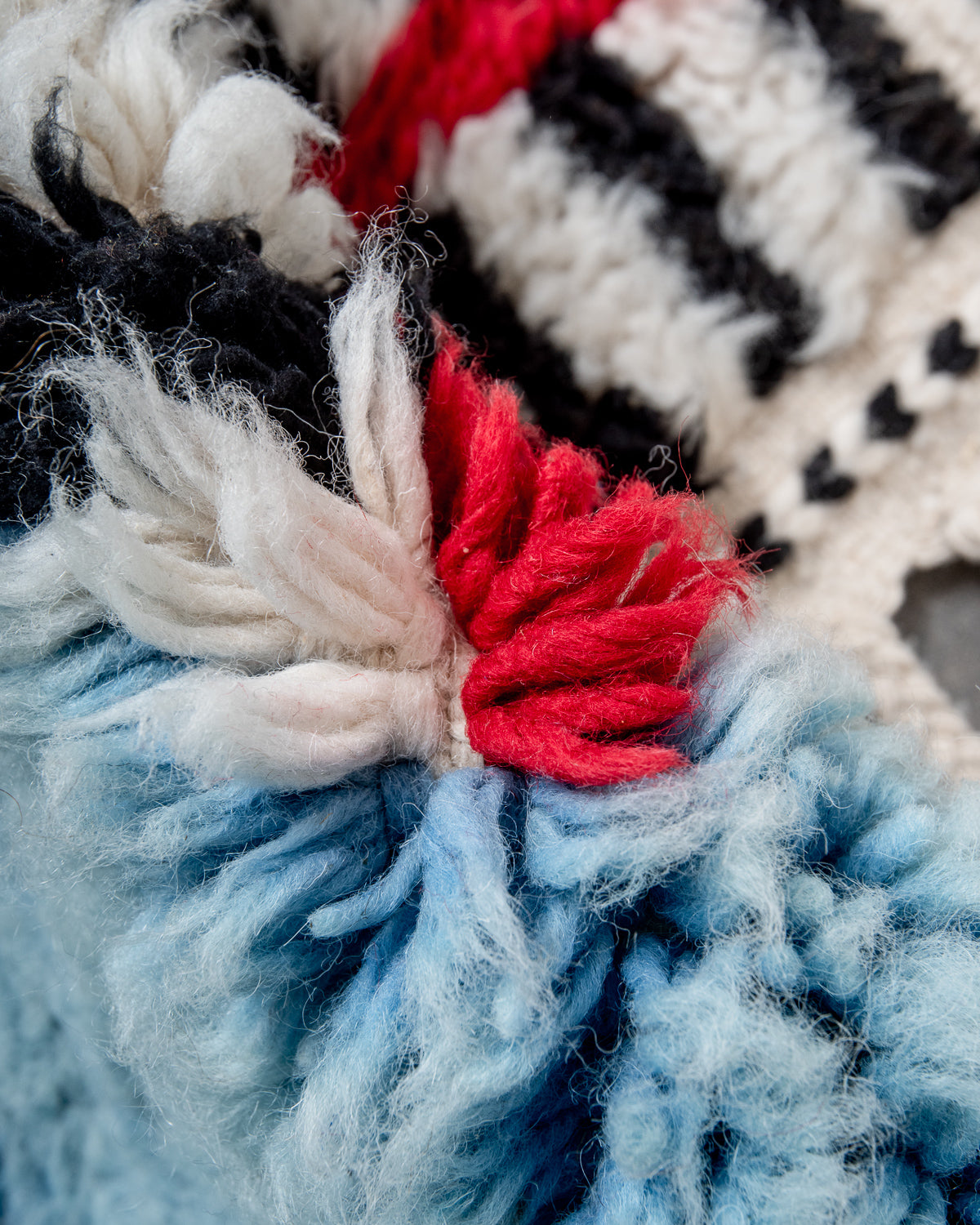Modern, designer, handcrafted Berber rug from Morocco. Beniourain carpet with beautiful colours and patterns and fluffy wool texture.